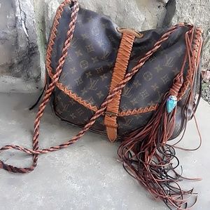 Louis Vuitton fringed Saumur 35